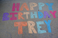 Happy Birthday in sidewalk chalk